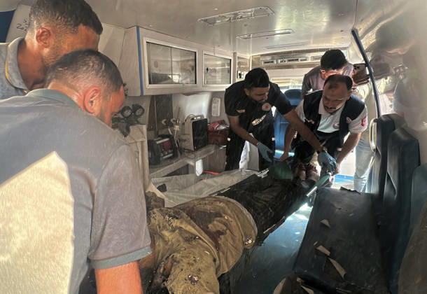 Palestinians Transport Dead and Wounded Following Israeli Airstrike in Gaza City Palestinians transport the bodies of people killed and others wounded to al-Shifa Hospital in Gaza City, on October 10, 2026, following an Israeli airstrike targeting a group of Palestinians in the western part of the city. Photo by Mohammed Salha apaimages Gaza Gaza Strip Palestinian Territory 101026_Gaza_MS_00(8) Copyright: xapaimagesxMohammedxSalhax xapaimagesx