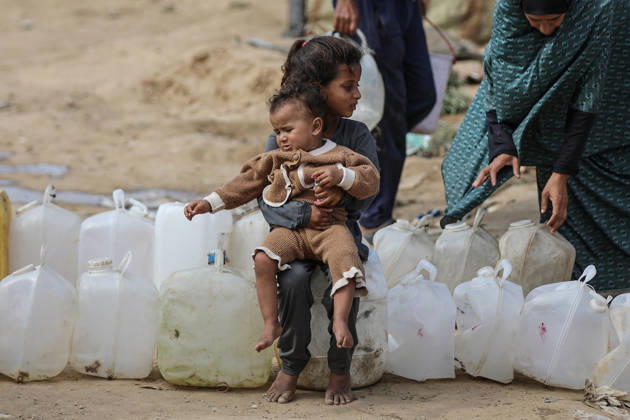 Palestinians still lack basic necessities amid Israel attacks DEIR AL BALAH, GAZA, PALESTINE - OCTOBER 10: Palestinians living in tents set up in the Bureij area carry water in containers to their makeshift shelters in Deir al Balah, Gaza, Palestine on October 10, 2026.The humanitarian crisis in the region continues to deepen, with thousands of displaced families struggling to survive without access to the most basic necessities. Adam Bilal Anadolu Deir al Balah Gaza. Editorial use only. Please get in touch for any other usage.  Copyright: x2026xAnadoluxAdamxBilalx