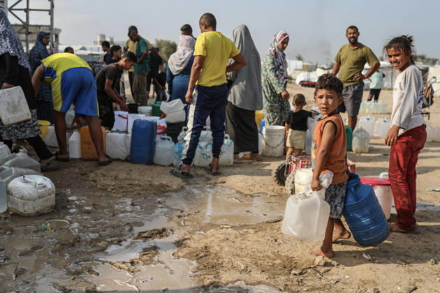 Palestinians still lack basic necessities amid Israel attacks DEIR AL BALAH, GAZA, PALESTINE - OCTOBER 10: Palestinians living in tents set up in the Bureij area carry water in containers to their makeshift shelters in Deir al Balah, Gaza, Palestine on October 10, 2026.The humanitarian crisis in the region continues to deepen, with thousands of displaced families struggling to survive without access to the most basic necessities. Adam Bilal Anadolu Deir al Balah Gaza. Editorial use only. Please get in touch for any other usage.  Copyright: x2026xAnadoluxAdamxBilalx
