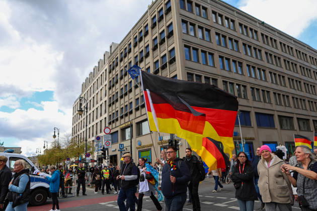 October 10, 2026, Berlin, Berlin, Germany: Demonstrators gather in Berlin for the Project M1llion rally against the German government. Participants take to the streets to voice their opposition to government policies, displaying banners and expressing their political demands. The demonstration brings together people seeking to make their concerns heard and draw public attention to their criticism of the country s political leadership. Berlin Germany  - ZUMAc291 20261010_zip_c291_006 Copyright: xMariaxCastrox