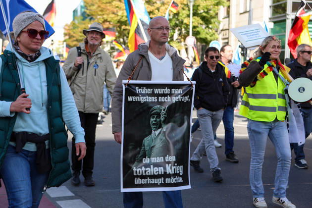 October 10, 2026, Berlin, Berlin, Germany: Demonstrators gather in Berlin for the Project M1llion rally against the German government. Participants take to the streets to voice their opposition to government policies, displaying banners and expressing their political demands. The demonstration brings together people seeking to make their concerns heard and draw public attention to their criticism of the country s political leadership. Berlin Germany  - ZUMAc291 20261010_zip_c291_002 Copyright: xMariaxCastrox
