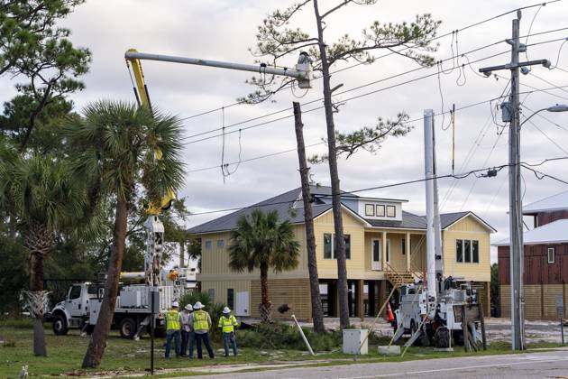 October 10, 2026, Orange Beach, Al, USA: Crews work to repair power lines after a tree fell on them as Hurricane Isaias came ashore..Hurricane Isaias made landfall Friday, October 9 along the U.S. Gulf coast. Orange Beach USA - ZUMAs197 20261010_aaa_s197_004 Copyright: xJenxGolbeckx