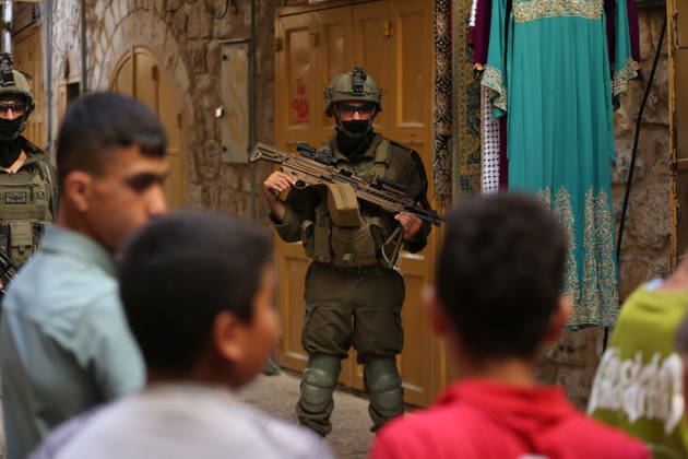 Israeli settlers raid Hebron in the West Bank HEBRON, PALESTINE, WEST BANK - OCTOBER 10: Israeli settlers, under the protection of Israeli forces, raid the Old City area of Hebron in the southern West Bank, Palestine, on October 10, 2026. During the raid, Israeli forces block entry and exit points, restricting the movement of Palestinians in the area. Wisam Hashlamoun Anadolu Hebron West Bank. Editorial use only. Please get in touch for any other usage. Copyright: x2026xAnadoluxWisamxHashlamounx