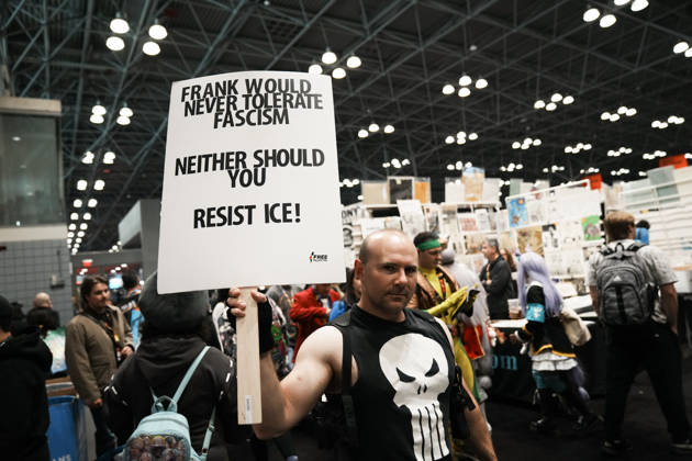 October 10, 2026, New York, New York, USA: A fan of The Punisher holds an anti-fascism and anti-CE sign at the 2026 NY Comic Con at the Javits Center on October 10, 2026 in New York. New York USA  - ZUMAb148 20261010_zap_b148_030 Copyright: xBryanxSmithx
