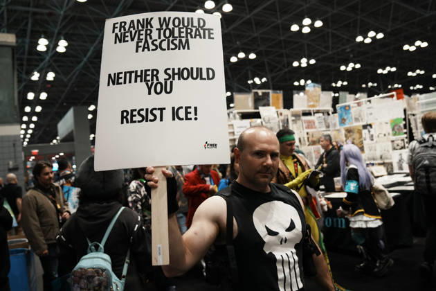 October 10, 2026, New York, New York, USA: A fan of The Punisher holds an anti-fascism and anti-CE sign at the 2026 NY Comic Con at the Javits Center on October 10, 2026 in New York. New York USA - ZUMAb148 20261010_zap_b148_016 Copyright: xBryanxSmithx