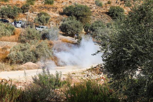 October 10, 2026, Ramallah: DEIR ABU MASHÃ¢â‚¬â ¢AL, PALESTINE Ã¢â‚¬ OCTOBER 10, 2026: Palestinian farmers came under attack by Israeli settlers and Israeli forces as they headed to harvest olives on their land in Deir Abu MashÃ¢â‚¬â ¢al, northwest of Ramallah. The event marked the villageÃ¢â‚¬â ¢s first olive harvest gathering of the new season. The Palestine Red Crescent Society reported that its teams treated nine people injured during the incident. The injuries included one caused by live ammunition to the thigh, two caused by rubber-coated metal bullets, and six resulting from physical assault. One of those struck by a rubber-coated metal bullet was photojournalist Issam Al-Rimawi. The incident occurred during the annual olive harve  - ZUMAq101 20261010_zna_q101_058 Copyright: xSalmanxMohsenxAlkhatibx