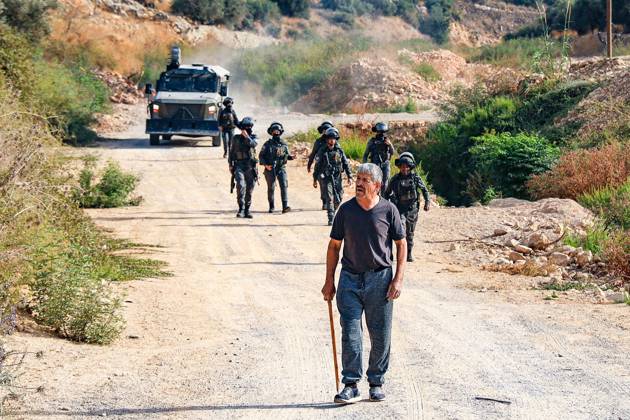 October 10, 2026, Ramallah: DEIR ABU MASHÃ¢â‚¬â ¢AL, PALESTINE Ã¢â‚¬ OCTOBER 10, 2026: Palestinian farmers came under attack by Israeli settlers and Israeli forces as they headed to harvest olives on their land in Deir Abu MashÃ¢â‚¬â ¢al, northwest of Ramallah. The event marked the villageÃ¢â‚¬â ¢s first olive harvest gathering of the new season. The Palestine Red Crescent Society reported that its teams treated nine people injured during the incident. The injuries included one caused by live ammunition to the thigh, two caused by rubber-coated metal bullets, and six resulting from physical assault. One of those struck by a rubber-coated metal bullet was photojournalist Issam Al-Rimawi. The incident occurred during the annual olive harve  - ZUMAq101 20261010_zna_q101_081 Copyright: xSalmanxMohsenxAlkhatibx