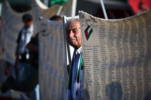 October 10, 2026, Athens, Attica, GREECE: An elderly man stands among banners bearing the names of Palestinians killed in Gaza during a pro-Palestinian demonstration. Athens GREECE  - ZUMAx103 20261010_zip_x103_020 Copyright: xHarrisxXanthopoulosx