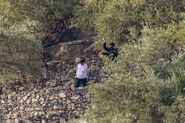 October 10, 2026, Ramallah: DEIR ABU MASHÃ¢â‚¬â ¢AL, PALESTINE Ã¢â‚¬ OCTOBER 10, 2026: Palestinian farmers came under attack by Israeli settlers and Israeli forces as they headed to harvest olives on their land in Deir Abu MashÃ¢â‚¬â ¢al, northwest of Ramallah. The event marked the villageÃ¢â‚¬â ¢s first olive harvest gathering of the new season. The Palestine Red Crescent Society reported that its teams treated nine people injured during the incident. The injuries included one caused by live ammunition to the thigh, two caused by rubber-coated metal bullets, and six resulting from physical assault. One of those struck by a rubber-coated metal bullet was photojournalist Issam Al-Rimawi. The incident occurred during the annual olive harve - ZUMAq101 20261010_zna_q101_074 Copyright: xSalmanxMohsenxAlkhatibx