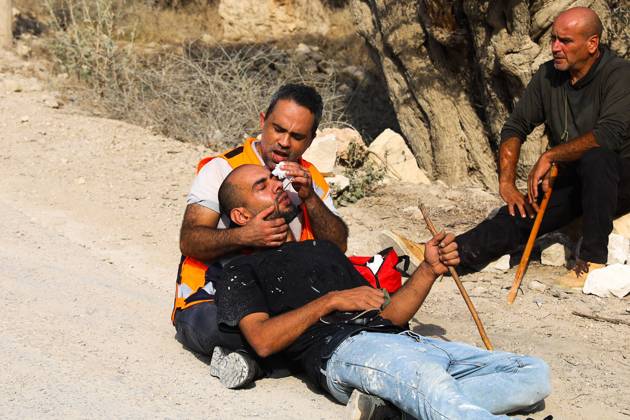 October 10, 2026, Ramallah: DEIR ABU MASHÃ¢â‚¬â ¢AL, PALESTINE Ã¢â‚¬ OCTOBER 10, 2026: Palestinian farmers came under attack by Israeli settlers and Israeli forces as they headed to harvest olives on their land in Deir Abu MashÃ¢â‚¬â ¢al, northwest of Ramallah. The event marked the villageÃ¢â‚¬â ¢s first olive harvest gathering of the new season. The Palestine Red Crescent Society reported that its teams treated nine people injured during the incident. The injuries included one caused by live ammunition to the thigh, two caused by rubber-coated metal bullets, and six resulting from physical assault. One of those struck by a rubber-coated metal bullet was photojournalist Issam Al-Rimawi. The incident occurred during the annual olive harve - ZUMAq101 20261010_zna_q101_082 Copyright: xSalmanxMohsenxAlkhatibx
