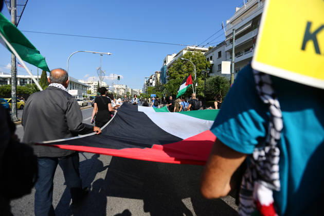 October 10, 2026, Athens, Attica, GREECE: Demonstrators carry a large Palestinian flag through the streets during a pro-Palestinian march. Athens GREECE - ZUMAx103 20261010_zip_x103_006 Copyright: xHarrisxXanthopoulosx