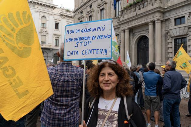 October 7, 2026, Milan, Italy: MILAN, ITALY †OCTOBER 10, 2026: Protesters gather for a sit-in in Piazza della Scala in central Milan to oppose the development of new data centers across Lombardy and Italy. The demonstration is organized by the Rete dei Comitati No Data Center (No Data Center Committee Network), which is calling for a moratorium on permits for new facilities. The group also urges public authorities to conduct thorough environmental, urban planning and regional assessments before approving projects. For approved facilities that have not yet begun operating, campaigners are calling for reviews to be reopened if potential microclimate effects and cumulative impacts with existing facilities were not adequately assessed. - ZUMAq101 20261007_zna_q101_444 Copyright: xCalogeroxRussox