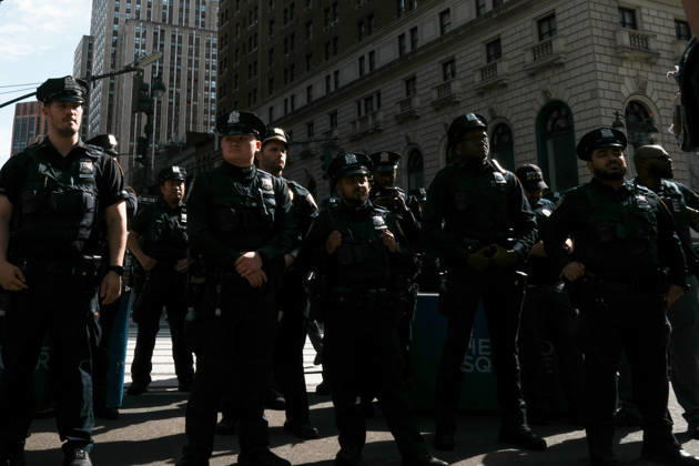 October 10, 2026, New York, New York, USA: Members of the NYPD look on at protesters at an anti-ICE protest in Herald Square on October 10, 2026 in New York City. Protesters take to the streets following an incident where ICE agents shot a 28-year-old-man, Oscar Belgal while he in a vehicle with his 5-year old child in the Marble Hill neighborhood in the Bronx. New York USA - ZUMAb148 20261010_zap_b148_048 Copyright: xBryanxSmithx