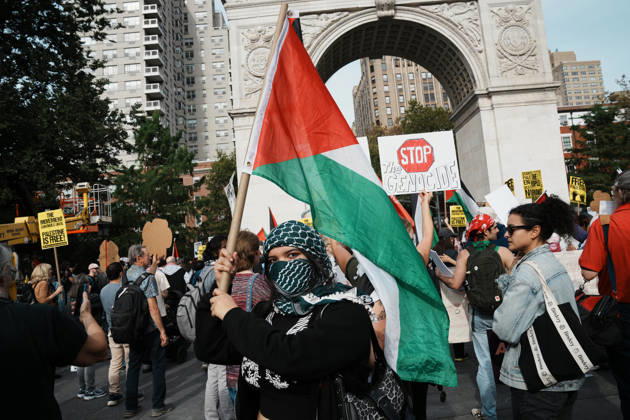 October 10, 2026, New York, New York, USA: A protester holds a Palestinian flag as hundreds of people attend a Pro-Palestine rally in Washington Square Park on October 10, 2026 in New York. New York USA - ZUMAb148 20261010_zap_b148_073 Copyright: xBryanxSmithx