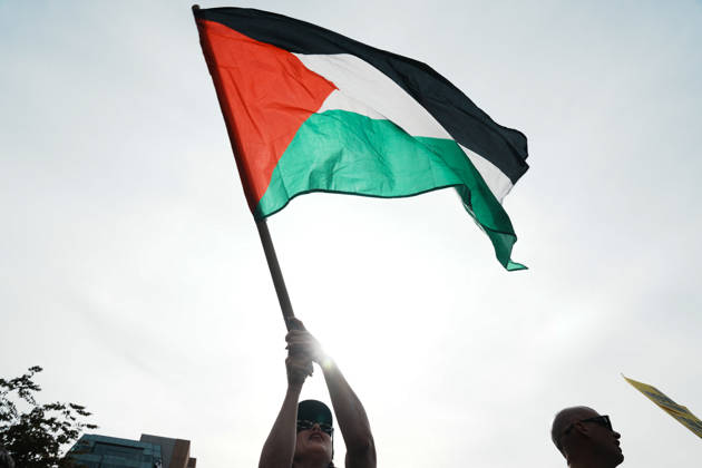 October 10, 2026, New York, New York, USA: A protester holds a Palestinian flag as hundreds of people attend a Pro-Palestine rally in Washington Square Park on October 10, 2026 in New York. New York USA - ZUMAb148 20261010_zap_b148_076 Copyright: xBryanxSmithx