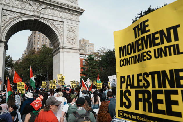 October 10, 2026, New York, New York, USA: A protester holds up a sign as hundreds of people attend a Pro-Palestine rally in Washington Square Park on October 10, 2026 in New York. New York USA - ZUMAb148 20261010_zap_b148_089 Copyright: xBryanxSmithx