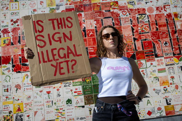 Palestine Solidarity March in Porto - 10 Oct 2026 A participant holds a placard during a Palestine solidarity demonstration. Hundreds of demonstrators gathered in Porto for a Palestine solidarity march calling for an end to the war in Gaza and support for Palestinian rights. The march began at Praça dos Poveiros and concluded at Praça D. João I. Porto Portugal Copyright: xDiogoxBaptistax xSOPAxImagesx DB_20261010FreePalestinePorto_0002