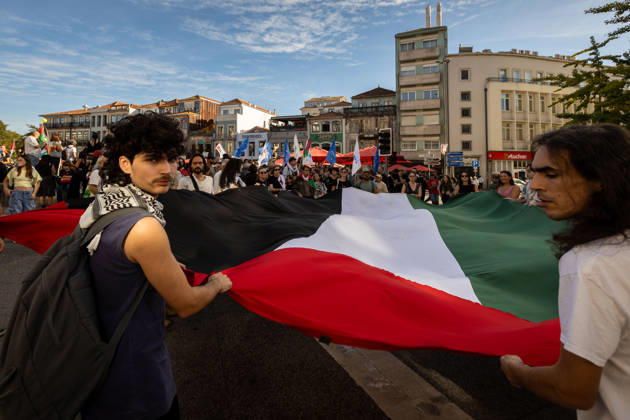October 10, 2026, Porto, Portugal: Participants carry a large Palestinian flag at the start of a Palestine solidarity march. Hundreds of demonstrators gathered in Porto for a Palestine solidarity march calling for an end to the war in Gaza and support for Palestinian rights. The march began at Praca dos Poveiros and concluded at Praca D. Joao I. Porto Portugal - ZUMAs197 20261010_aaa_s197_454 Copyright: xDiogoxBaptistax
