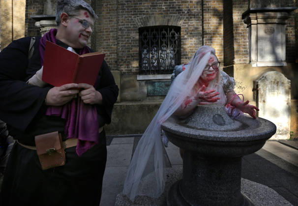 World Zombie Day In London, UK - 10 Oct 2026 A zombie vicar and bride sat a church yard in Wardour Street during the celebration. Supporters of World Zombie Day dressed in their best zombie attire and took to the streets and open spaces of London’s Soho district. The event started in the United States in 2006 and raises money through donations for charities like The Dead Good Club that helps people keep abreast of fast changing technologies like AI and digital media. London United Kingdom Copyright: xMartinxPopex xSOPAxImagesx MPOPE_A738417