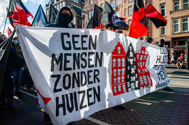 October 10, 2026, Amsterdam, North Holland, Netherlands: Protesters hold a banner saying No people without houses, during the demonstration. People gathered against the worsening housing crisis. Under the motto Houses for people, not for profit, they demand fundamental changes in Dutch public housing. Amsterdam Netherlands  - ZUMAs197 20261010_aaa_s197_539 Copyright: xAnaxFernandezx