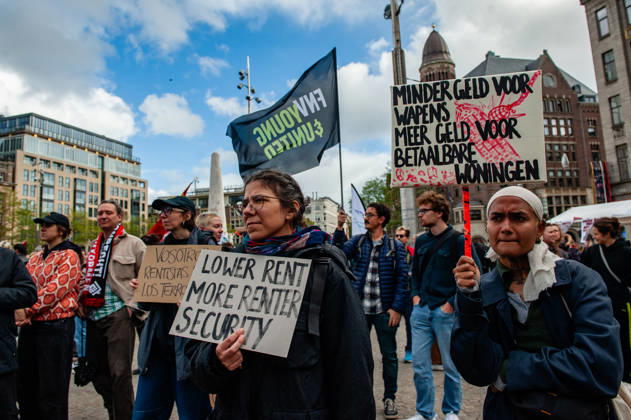 October 10, 2026, Amsterdam, North Holland, Netherlands: Protesters are holding placards asking for more money for housing during the demonstration. People gathered against the worsening housing crisis. Under the motto Houses for people, not for profit, they demand fundamental changes in Dutch public housing. Amsterdam Netherlands  - ZUMAs197 20261010_aaa_s197_558 Copyright: xAnaxFernandezx