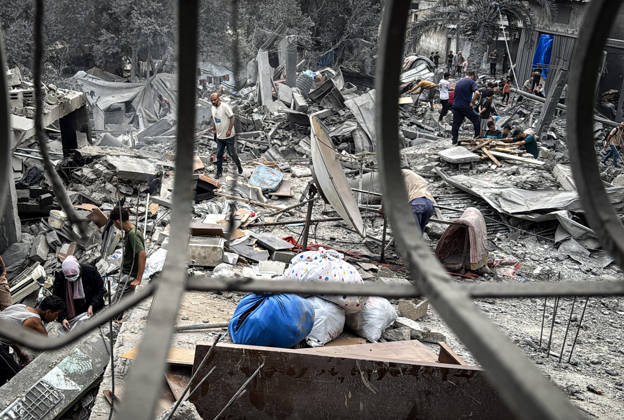 Palestinians Inspect Damage After Strike in Deir al-Balah Palestinians inspect their belongings amid the rubble of damaged residential buildings and their displacement tents after an Israeli airstrike targeted a house in Deir al-Balah, in the central Gaza Strip, on October 11, 2026. Photo by Ahmed Ibrahim apaimages Deir al-Balah Gaza Palestinian Territory 111026_Deir_al-Balah_AI_00(15) Copyright: xapaimagesxAhmedxIbrahimx xapaimagesx