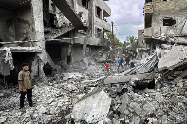 Palestinians Inspect Damage After Strike in Deir al-Balah Palestinians inspect their belongings amid the rubble of damaged residential buildings and their displacement tents after an Israeli airstrike targeted a house in Deir al-Balah, in the central Gaza Strip, on October 11, 2026. Photo by Ahmed Ibrahim apaimages Deir al-Balah Gaza Palestinian Territory 111026_Deir_al-Balah_AI_00(21) Copyright: xapaimagesxAhmedxIbrahimx xapaimagesx