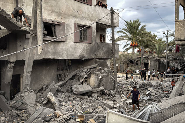 Palestinians Inspect Damage After Strike in Deir al-Balah Palestinians inspect their belongings amid the rubble of damaged residential buildings and their displacement tents after an Israeli airstrike targeted a house in Deir al-Balah, in the central Gaza Strip, on October 11, 2026. Photo by Ahmed Ibrahim apaimages Deir al-Balah Gaza Palestinian Territory 111026_Deir_al-Balah_AI_00(22) Copyright: xapaimagesxAhmedxIbrahimx xapaimagesx