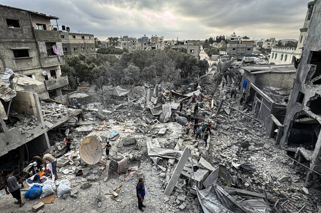 Palestinians Inspect Damage After Strike in Deir al-Balah Palestinians inspect their belongings amid the rubble of damaged residential buildings and their displacement tents after an Israeli airstrike targeted a house in Deir al-Balah, in the central Gaza Strip, on October 11, 2026. Photo by Ahmed Ibrahim apaimages Deir al-Balah Gaza Palestinian Territory 111026_Deir_al-Balah_AI_00(6) Copyright: xapaimagesxAhmedxIbrahimx xapaimagesx