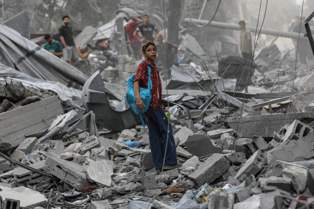 Israeli attack on Az-Zawayda area in Gaza DEIR AL-BALAH, GAZA, PALESTINE - OCTOBER 11: A Palestinian girl stands amid the rubble of destroyed buildings following an Israeli airstrike targeting a building belonging to the Buheysi family in the town of Az-Zawayda, near Deir al-Balah in the central Gaza Strip, on October 11, 2026. Israeli forces carried out the strike despite the ceasefire, destroying the targeted building and damaging surrounding structures. Adam Bilal Anadolu Deir Al-Balah Gaza. Editorial use only. Please get in touch for any other usage.  Copyright: x2026xAnadoluxAdamxBilalx