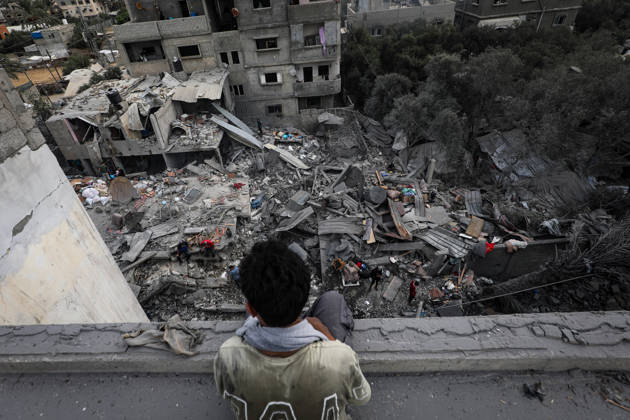 Palestinians Inspect Damage After Strike in Al-Zawayda Palestinians inspect their belongings amid the rubble of damaged residential buildings after an Israeli airstrike targeted a residential block in Al-Zawayda, in the central Gaza Strip, on October 11, 2026. Photo by Moiz Salhi apaimages Nusairat Gaza Strip Palestinian Territory 111026_Al-Zawayda_MS_00(17) Copyright: xapaimagesxMoizxSalhixx xapaimagesx