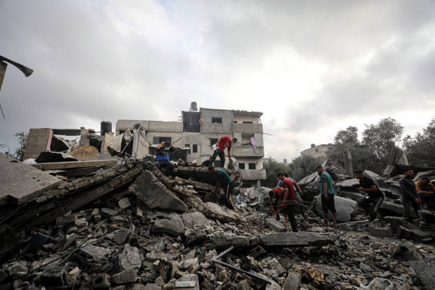 Palestinians Inspect Damage After Strike in Al-Zawayda Palestinians inspect their belongings amid the rubble of damaged residential buildings after an Israeli airstrike targeted a residential block in Al-Zawayda, in the central Gaza Strip, on October 11, 2026. Photo by Moiz Salhi apaimages Nusairat Gaza Strip Palestinian Territory 111026_Al-Zawayda_MS_00(4) Copyright: xapaimagesxMoizxSalhixx xapaimagesx