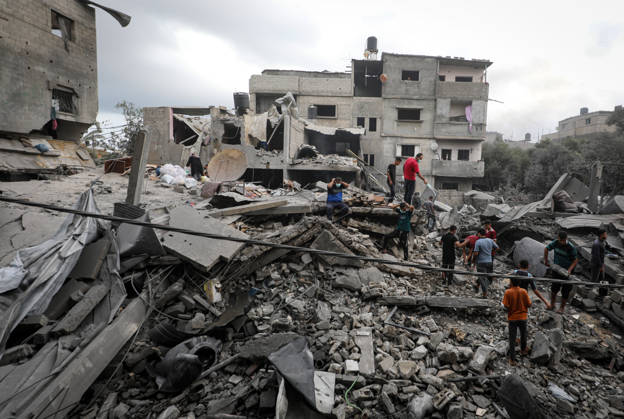 Palestinians Inspect Damage After Strike in Al-Zawayda Palestinians inspect their belongings amid the rubble of damaged residential buildings after an Israeli airstrike targeted a residential block in Al-Zawayda, in the central Gaza Strip, on October 11, 2026. Photo by Moiz Salhi apaimages Nusairat Gaza Strip Palestinian Territory 111026_Al-Zawayda_MS_00(5) Copyright: xapaimagesxMoizxSalhixx xapaimagesx