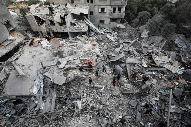 Palestinians Inspect Damage After Strike in Al-Zawayda Palestinians inspect their belongings amid the rubble of damaged residential buildings after an Israeli airstrike targeted a residential block in Al-Zawayda, in the central Gaza Strip, on October 11, 2026. Photo by Moiz Salhi apaimages Nusairat Gaza Strip Palestinian Territory 111026_Al-Zawayda_MS_00(13) Copyright: xapaimagesxMoizxSalhixx xapaimagesx
