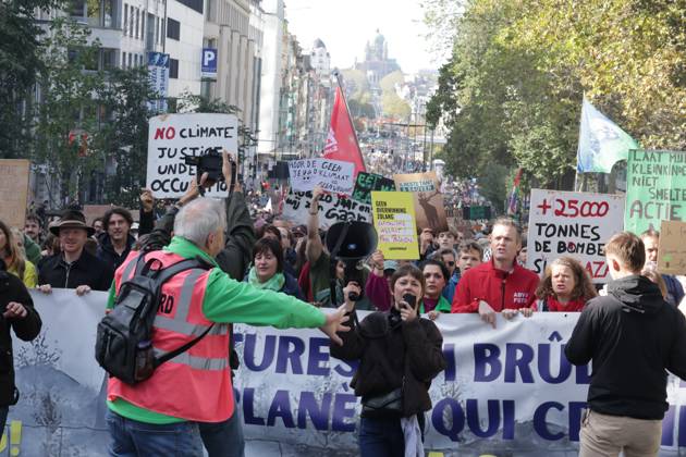This image shows the Climate March 2026, organized by the Climate Coalition, in Brussels, on Sunday 11 October 2026. The Climate Coalition demands the federal and regional governments to stop subsidizing polluting industrial activities in Belgium and levy higher taxes on these companies.  NICOLASxMAETERLINCK 189447100