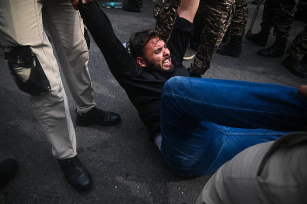October 11, 2026, New Delhi, Delhi, India: Security personnel detain a protestor during a protest seeking the resignation of India s Chief Election Commissioner Gyanesh Kumar, over alleged electoral malpractices in the Special Intensive Revision (SIR) of electoral rolls, in New Delhi, India on October 11, 2026. New Delhi India - ZUMAj168 20261011_zip_j168_017 Copyright: xKabirxJhangianix