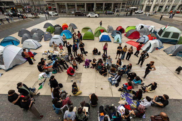 October 11, 2026, Porto, Portugal: Protesters seen inside a temporary encampment established in Praca D. Joao I by the Nao Da Mais Para Viver Assim movement following demonstrations against housing affordability and the rising cost of living. Porto Portugal - ZUMAs197 20261011_aaa_s197_041 Copyright: xDiogoxBaptistax