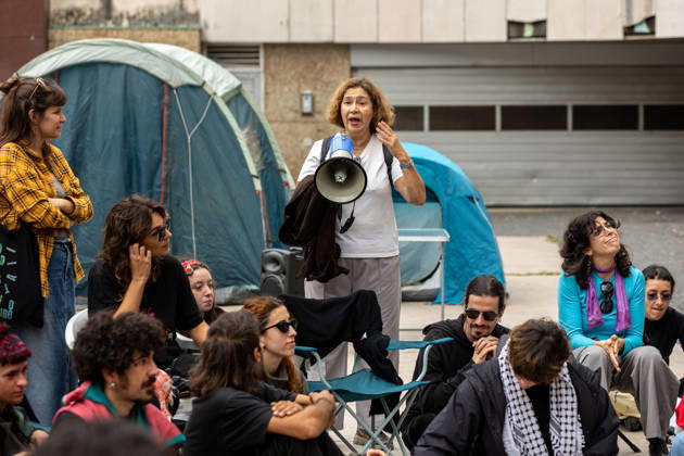 October 11, 2026, Porto, Portugal: Participants have a public assembly beside a temporary encampment in Praca D. Joao I during an overnight occupation organized by the Nao Da Mais Para Viver Assim movement following demonstrations against the housing crisis and rising living costs. Porto Portugal - ZUMAs197 20261011_aaa_s197_042 Copyright: xDiogoxBaptistax