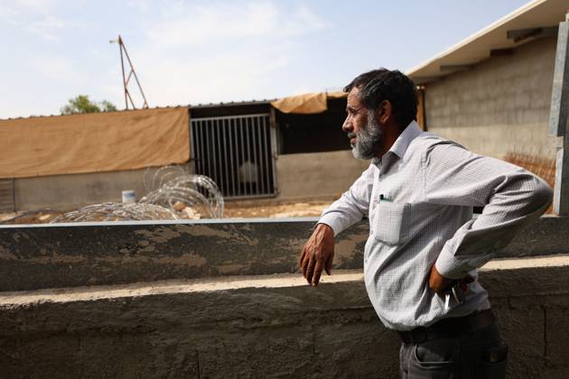 Settlers restrict access to Palestinian property UMM AL-KHAIR, MASAFER YATTA, OCCUPIED WEST BANK, OCTOBER 11, 2026: Israeli settlers placed barbed wire in the sheep pen yard and plastic sheets in front of the windows of the Salem al-Hathaleen family home in Umm al-Khair, Masafer Yatta, south of Hebron. The Israeli military subsequently declared the area a closed military zone, preventing the family from accessing the sheep pen and backyard, where a newly established settler outpost is located. MASAFER YATTA Palestine, State of Copyright: x xMosabxshawerx xJNAxPressx