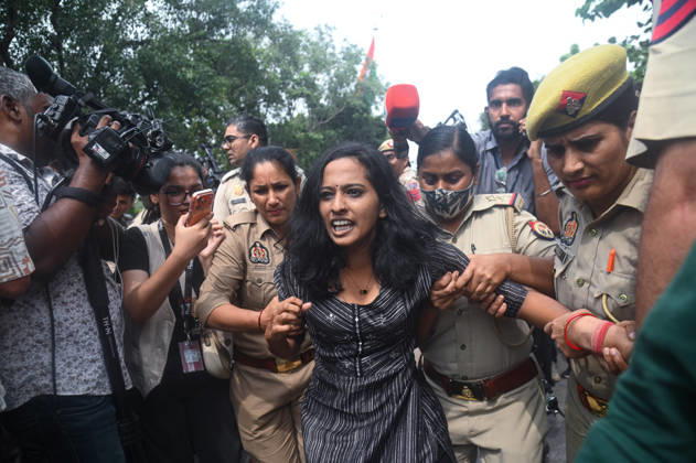 October 11, 2026, New Delhi, Delhi, India: Security personnel detain a protestor during a protest seeking the resignation of India s Chief Election Commissioner Gyanesh Kumar, over alleged electoral malpractices in the Special Intensive Revision (SIR) of electoral rolls. New Delhi India - ZUMAj168 20261011_zip_j168_011 Copyright: xKabirxJhangianix