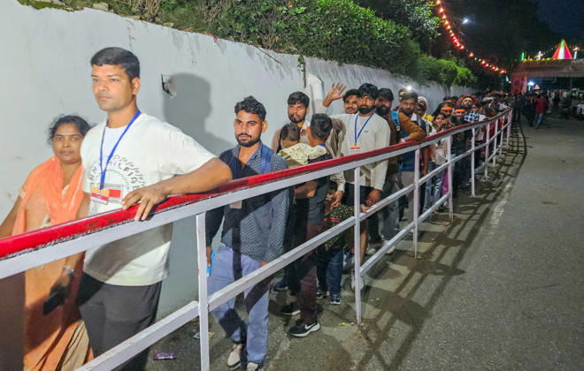 RECORD DATE NOT STATED Hindu Devotees Gather at the Mata Vaishno Devi Shrine Katra, Oct 11 (ANI): A heavy crowd gathers at RFID card counters as pilgrims collect their cards and begin their journey on the occasion of Shardiya Navratri to seek the blessings of Goddess Durga at Mata Vaishno Devi Temple, in Katra on Sunday. Katra Jammu and Kashmir India Copyright: xANIx ANI_20261011060