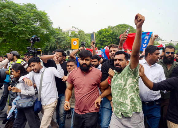 Protesters during a protest against CEC Gyanesh Kumar at Connaught Place in New Delhi New Delhi, Oct 11 (ANI): Protesters during a protest against Chief Election Commissioner Gyanesh Kumar at Connaught Place, in New Delhi on Sunday. NEW DELHI Delhi India Copyright: xANIx ANI_20261011327