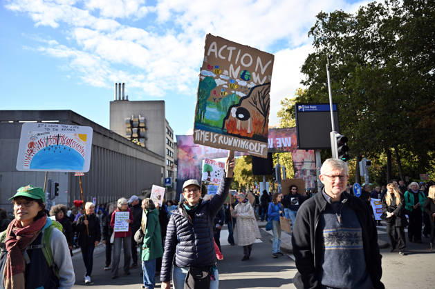Tens of thousands march in Brussels demanding stronger climate action BRUSSELS, BELGIUM - OCTOBER 11: Demonstrators hold climate-themed placards as tens of thousands of people march through Brussels calling for stronger action against climate change and reduced dependence on fossil fuels, on October 11, 2026 in Brussels, Belgium. The protest was organized by the Belgian Climate Coalition, which brings together around 100 civil society organizations. Participants marched along major roads toward Schuman Square, home to several European Union institutions, while protesting the government s climate policies. Dursun Aydemir Anadolu Brussels Belgium. Editorial use only. Please get in touch for any other usage.  Copyright: x2026xAnadoluxDursunxAydemirx
