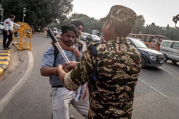 Protest to demand resignation of India s chief election commissioner in New Delhi NEW DELHI, INDIA - OCTOBER 11: Indian police officers detain a protestor during a mass protest organized by the Cockroach Janta Party (CJP) in New Delhi, India on October 11, 2026. Demonstrators gathered to demand the resignation of Chief Election Commissioner Gyanesh Kumar over alleged electoral roll irregularities and revisions. Yousuf Sarfaraz Anadolu New Delhi India. Editorial use only. Please get in touch for any other usage.  Copyright: x2026xAnadoluxYousufxSarfarazx