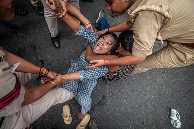 Protest to demand resignation of India s chief election commissioner in New Delhi NEW DELHI, INDIA - OCTOBER 11: Indian police officers detain a protestor during a mass protest organized by the Cockroach Janta Party (CJP) in New Delhi, India on October 11, 2026. Demonstrators gathered to demand the resignation of Chief Election Commissioner Gyanesh Kumar over alleged electoral roll irregularities and revisions. Yousuf Sarfaraz Anadolu New Delhi India. Editorial use only. Please get in touch for any other usage.  Copyright: x2026xAnadoluxYousufxSarfarazx