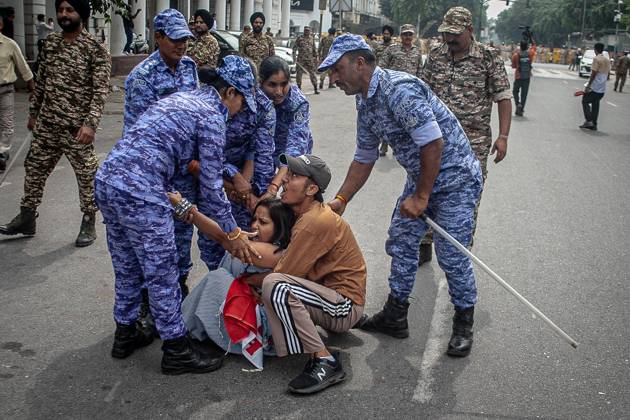 Protest to demand resignation of India s chief election commissioner in New Delhi NEW DELHI, INDIA - OCTOBER 11: Indian police officers detain a protestor during a mass protest organized by the Cockroach Janta Party (CJP) in New Delhi, India on October 11, 2026. Demonstrators gathered to demand the resignation of Chief Election Commissioner Gyanesh Kumar over alleged electoral roll irregularities and revisions. Yousuf Sarfaraz Anadolu New Delhi India. Editorial use only. Please get in touch for any other usage.  Copyright: x2026xAnadoluxYousufxSarfarazx