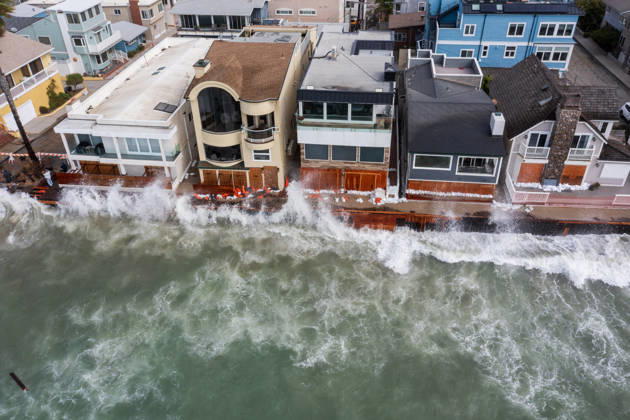 October 11, 2006, Long Beach, California, USA: The Long Beach Peninsula is facing severe, structural devastation as Tropical Storm Rachel batters the Southern California coast. Driven by a developing El Nino pattern, this is the fourth major storm system to slam the shoreline in six weeks. Waves and unusually high tides have shattered a 30-foot section of the protective wooden bulkhead, completely shredding the historic boardwalk and allowing seawater to surge directly onto interior streets. Flooding has swamped coastal neighborhoods, forcing mandatory evacuations along oceanfront blocks like Seaside Walk. Emergency crews are working to stack thousands of sandbags and reinforce coastal defenses, but city inspectors have already been forced - ZUMAr19_ 20261011_new_r19_123 Copyright: xRuaridhxStewartx