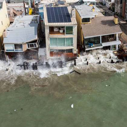 October 11, 2006, Long Beach, California, USA: The Long Beach Peninsula is facing severe, structural devastation as Tropical Storm Rachel batters the Southern California coast. Driven by a developing El Nino pattern, this is the fourth major storm system to slam the shoreline in six weeks. Waves and unusually high tides have shattered a 30-foot section of the protective wooden bulkhead, completely shredding the historic boardwalk and allowing seawater to surge directly onto interior streets. Flooding has swamped coastal neighborhoods, forcing mandatory evacuations along oceanfront blocks like Seaside Walk. Emergency crews are working to stack thousands of sandbags and reinforce coastal defenses, but city inspectors have already been forced - ZUMAr19_ 20261011_new_r19_134 Copyright: xRuaridhxStewartx
