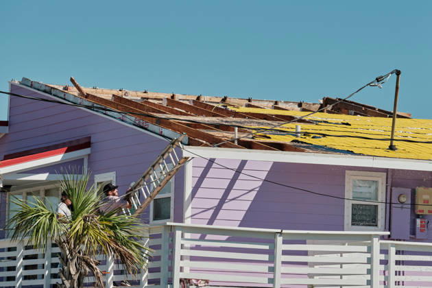 October 11, 2026, Pensacola Beach, Florida, U.S: October 11, 2026 Pensacola Beach, Florida USA: Contractors get on the roof to inspect itÃ¢â‚¬â ¢s damage after the arrival of Hurricane Isaias. Pensacola Beach U.S - ZUMAa14_ 20261011_zaf_a14_016 Copyright: xDanxAndersonx