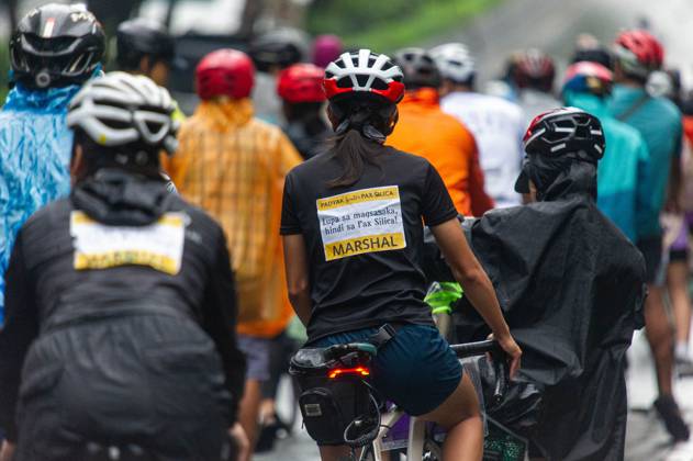 Cyclists Protest US-Led Pax Silica Initiative MANILA, PHILIPPINES - OCTOBER 12, 2026: A bike ride was led by local cyclists, along with environmental advocates, in condemnation of the US-led Pax Silica Initiative that participants say will destroy the livelihoods of local farming communities, displace local indigenous communities, and consume tremendous amounts of water that would have otherwise be utilized by local Filipinos. The route started in the Quezon City Hall and ended in the Bonifacio Shrine where the closing program was held with each sector that participated in the bike ride expressing their message of solidarity to the cause. Multiple stops where held in front of the office of the Department of Environment and Natural Resources Copyright: x xCharlesxEdmonxS.xPerezx xJNAxPressx